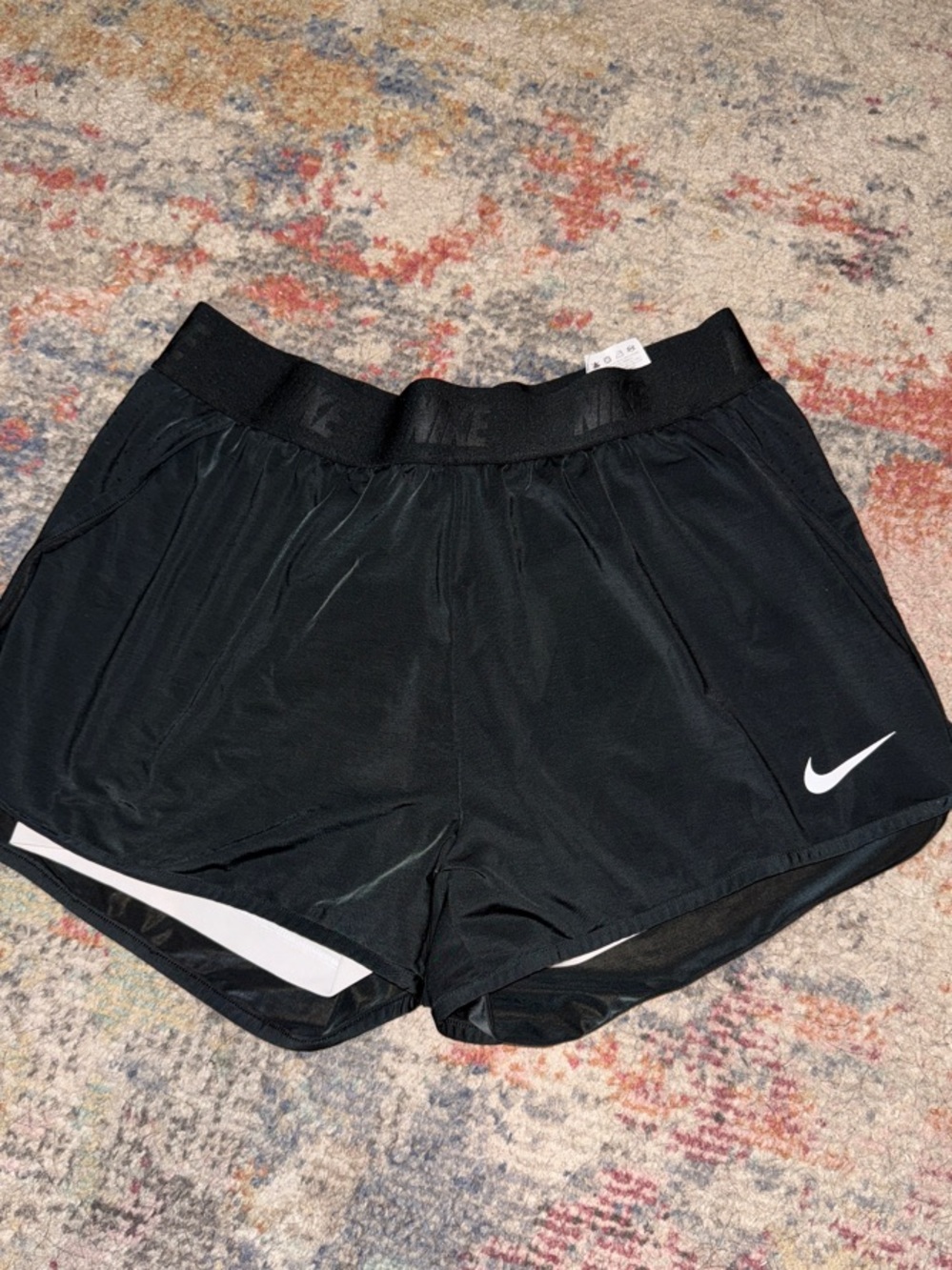 Nike Women's Black Athletic Shorts with White Swoosh